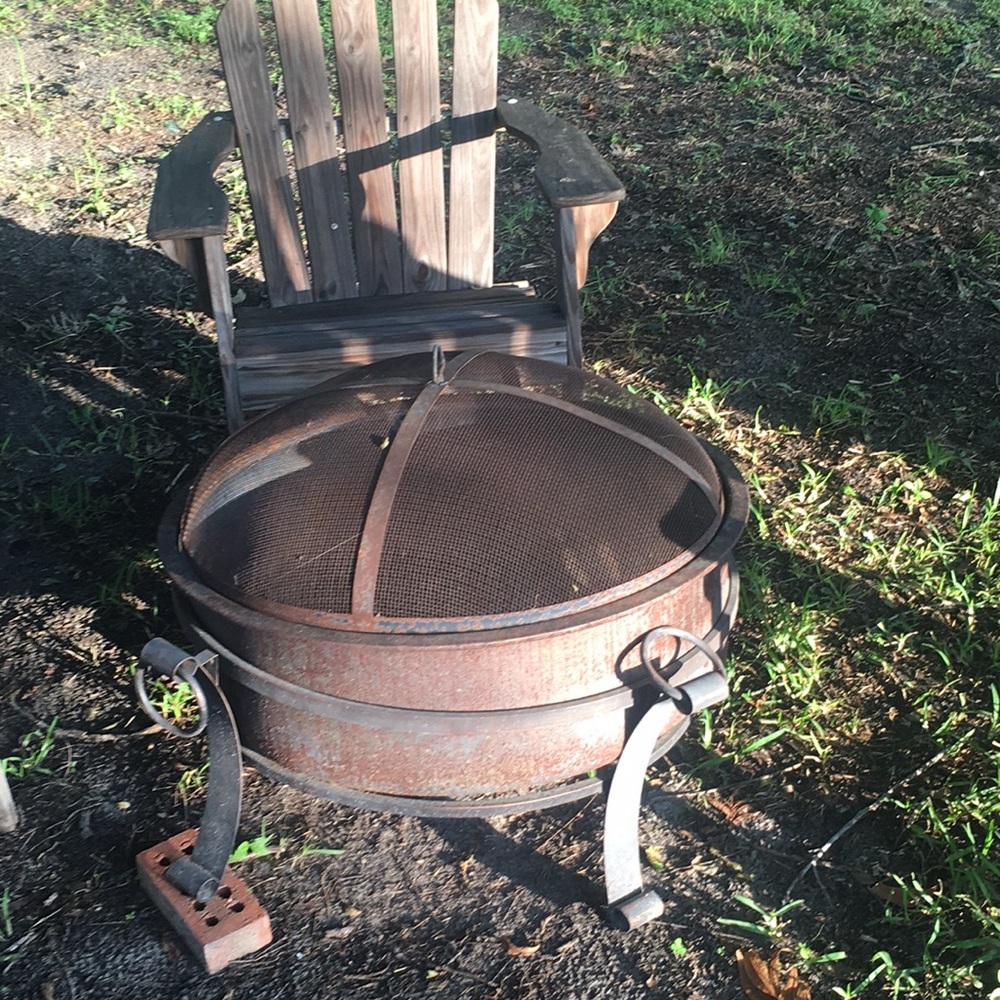 Fire pit with three lounge chairs